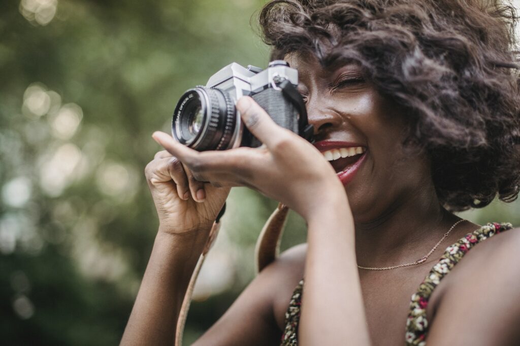 Woman Taking Pictures with a Camera